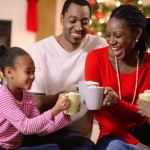 A family drinking hot chocolate during the winter holidays